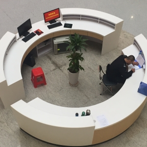Round artificial stone desk in the lobby